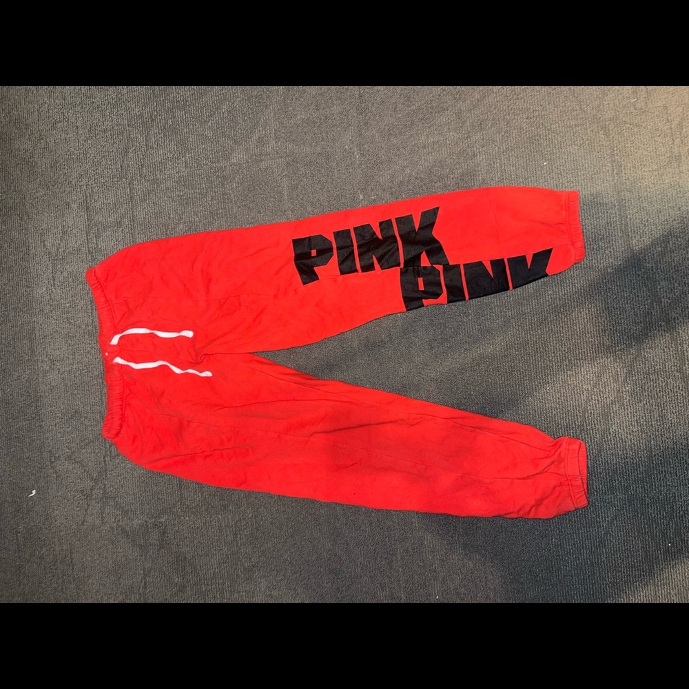 Pink sweatpants.